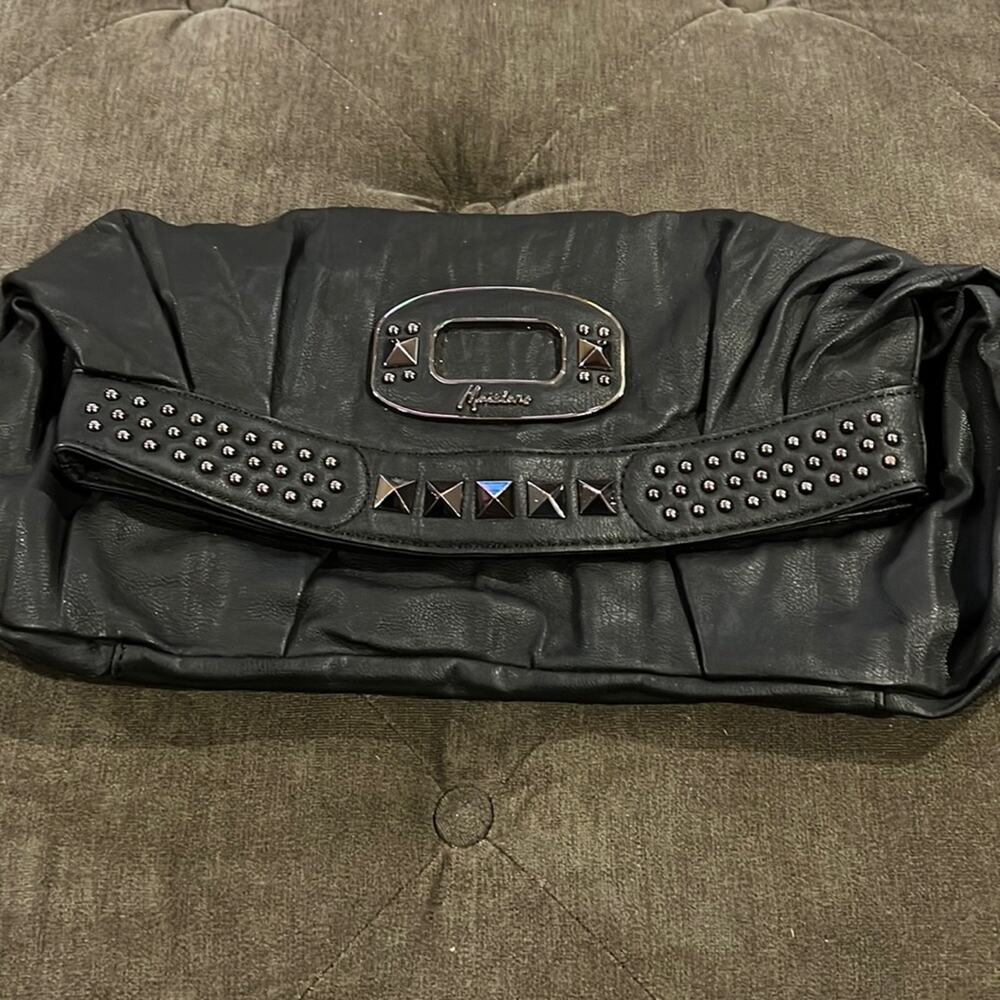 Marciano clutch with snap fold closure